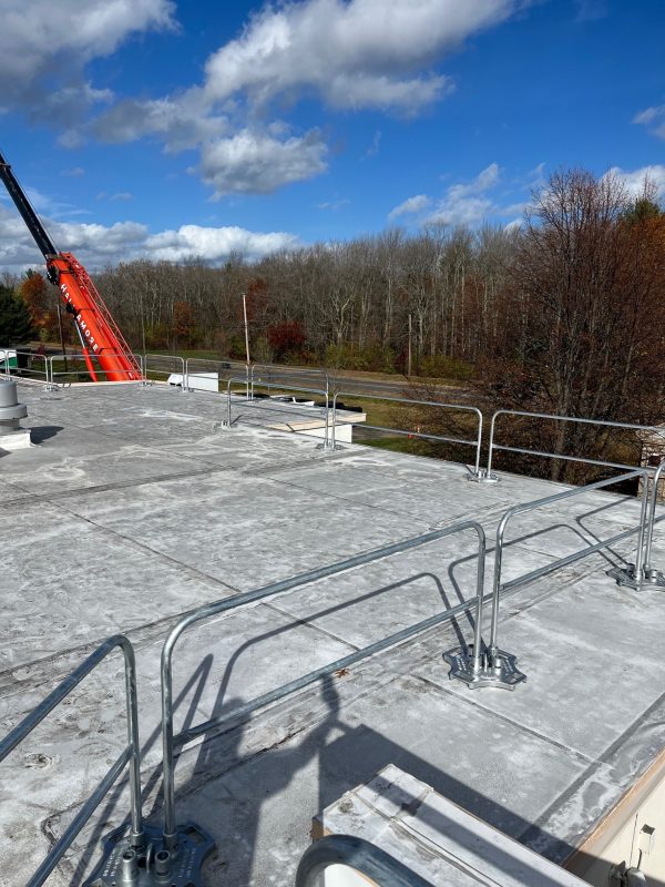 Safety Rail 2000 (SR2K) rooftop guardrail system - Non-penetrating fall protection safety rail - Portable or permanent installation - OSHA compliant - BlueWater SR2000