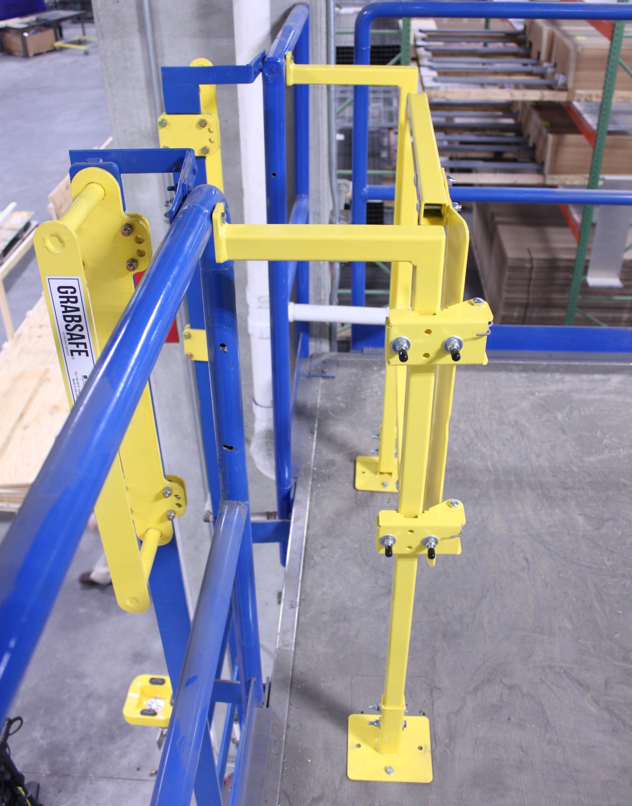 Standoff Mounting System - Adds 7.5 in. of clearance on the platform edge - Provides a grab spot for personnel using ladder - Mounts directly to existing railing - Adjustable height - Easy installation - PS DOORS LSG-STNDOFF image 3